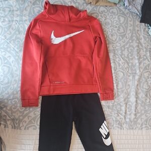 Nike Red Pullover with Black Tights